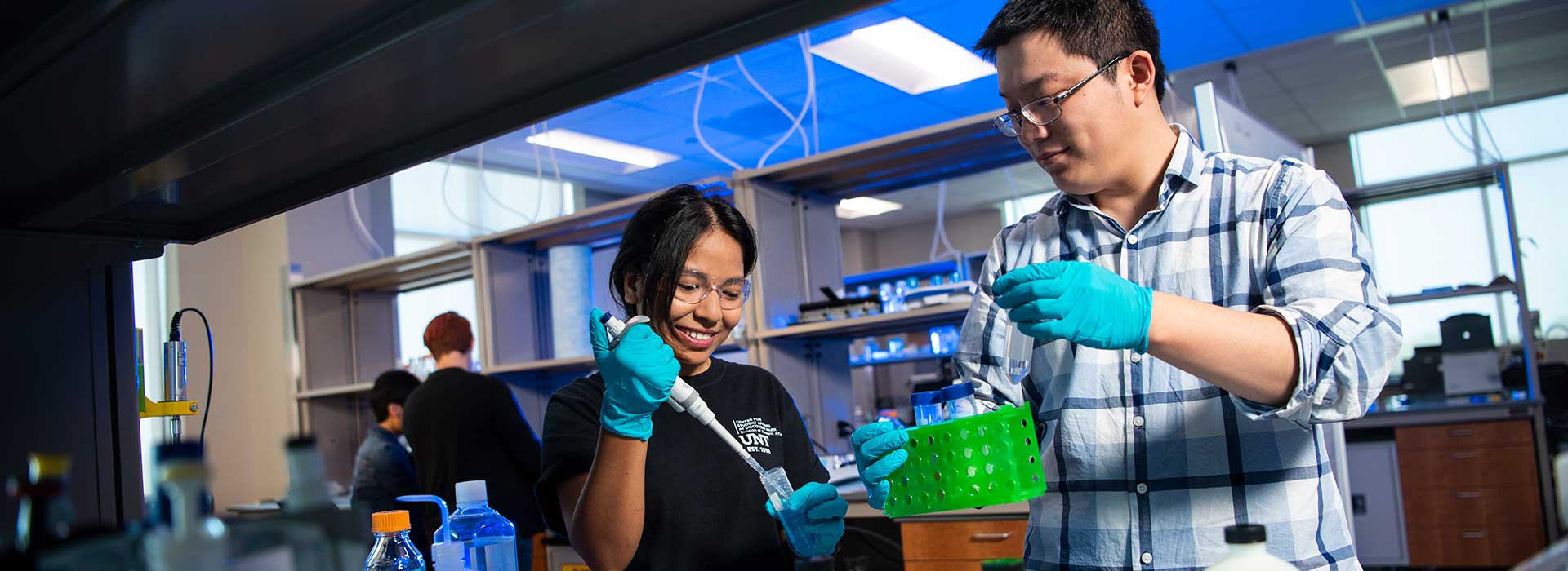 Two students collaborating in the lab.