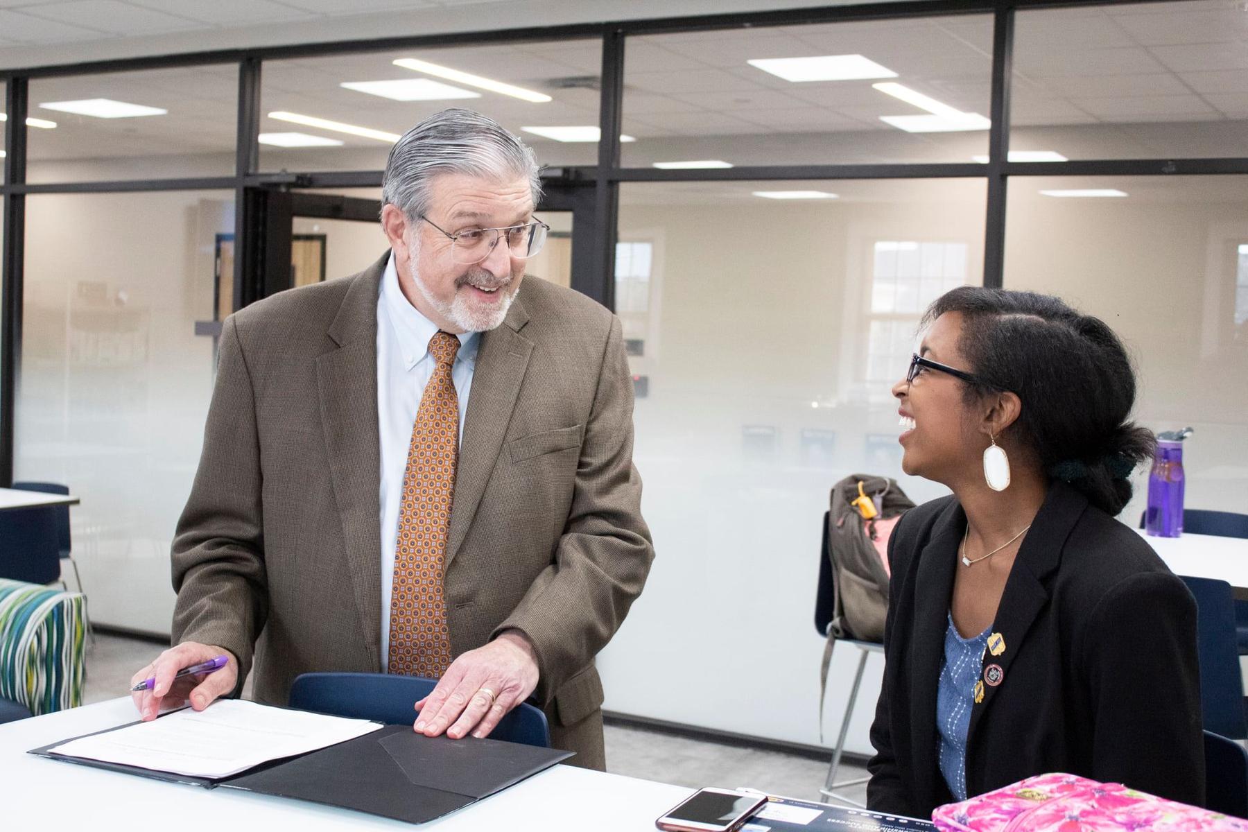 Dr. Duban discussing Research with a student.