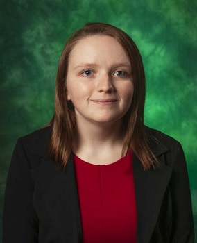 Photo of Jewel Aleshire with a green background