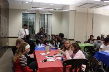 Students talking at the table