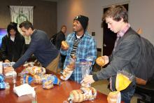 Several students getting bagels