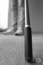 Black and white photo of a cane.